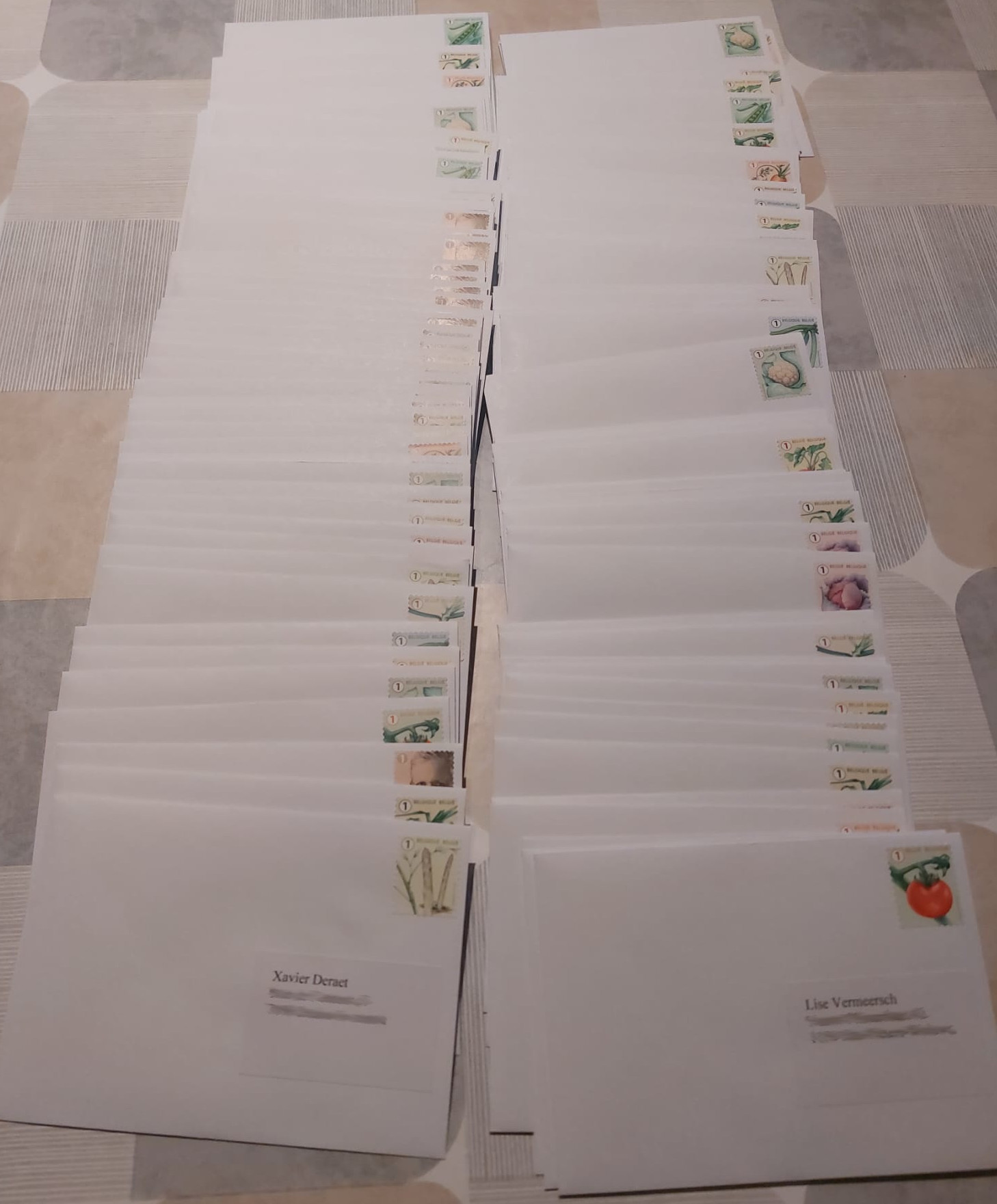 Cards displayed on the table in various stages of being finished